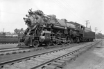 the southern crescent locomotive in 1917 for the southern railroad company. Train is sitting on tracks.