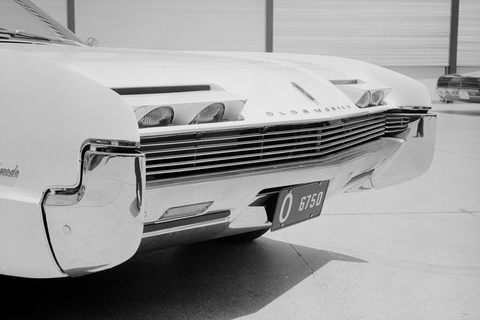 1966 Olsmobile Toronado headlight and grill.