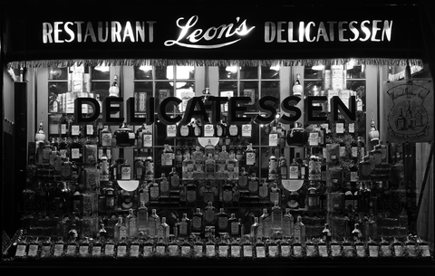 Window display of whiskey at Leon's Delicatessen in Washington D.C