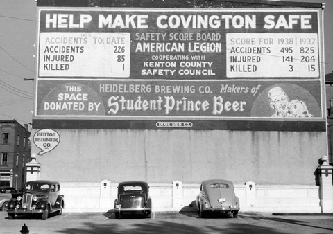 A parking lot in Covington, Kentucky displays traffic records from 1937 and 1938. Space donated by Heidelberg Brewing Co. Makers of Student Prince Beer.