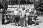 kids standing around a Fourth of July roadside firework stand near Milwaukee, Wisconsin