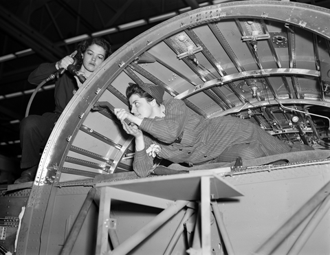  A girl team working on a center wing section of a B-24E